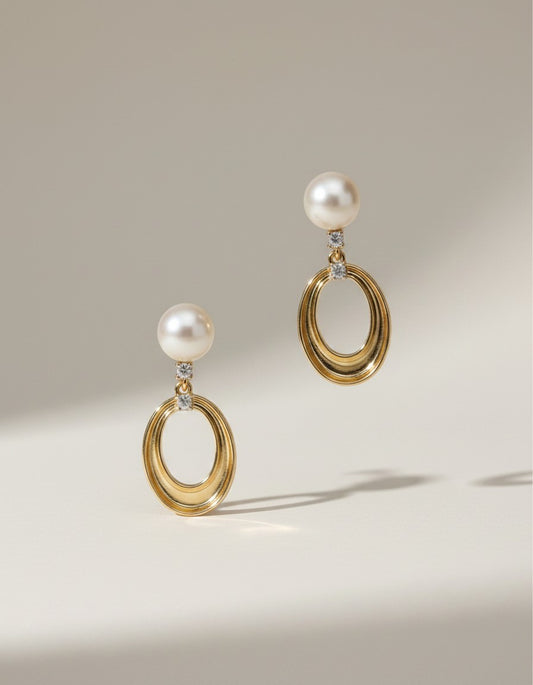 Muchi 14k yellow gold oval drop earrings with pearls and diamond accents.