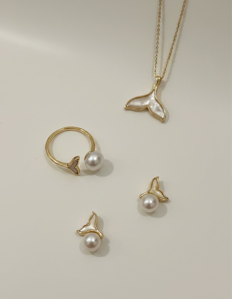 Muchier whale tail and pearl jewelry set with necklace, earrings, and adjustable ring. Gold-tone trim with mother-of-pearl inlay.